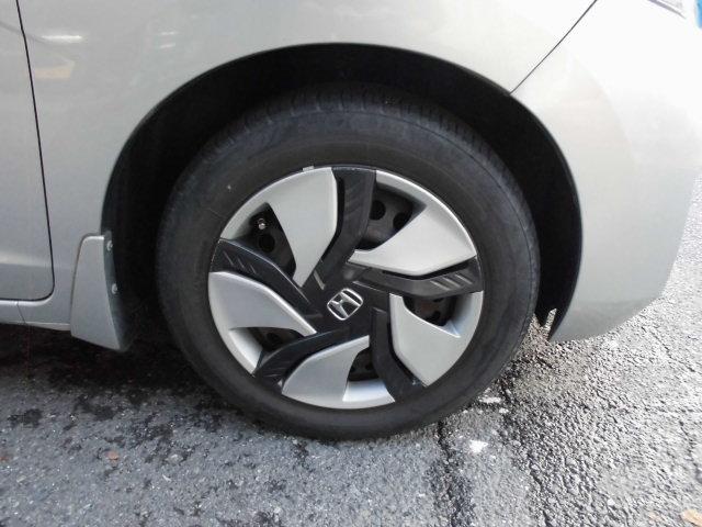 フィットハイブリッド Ｆパッケージ　ナビ　ＥＴＣ　プッシュスタート　フルフラット　安全ボディ　盗難警報装置　ＡＵＴＯエアコン　助手席エアバック　ＥＣＯＮ　ＡＢＳ付　横滑り防止システム　キーレスエントリー　運転席エアバック　パワーステアリング　パワーウィンドウ（54枚目）