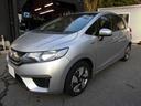 フィットハイブリッド Ｆパッケージ　ナビ　ＥＴＣ　プッシュスタート　フルフラット　安全ボディ　盗難警報装置　ＡＵＴＯエアコン　助手席エアバック　ＥＣＯＮ　ＡＢＳ付　横滑り防止システム　キーレスエントリー　運転席エアバック　パワーステアリング　パワーウィンドウ（6枚目）