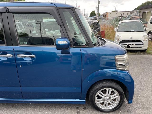 N-BOXカスタム G・Lパッケージ 禁煙車 スマートキー(スペアキー付き) 助手席側後部オートスライドドア 格納式リモコンウィンカーミラー 辞すチャージャーヘッドライト フォグランプ 純正アルミホイール(165/55R14)ETC(18枚目)