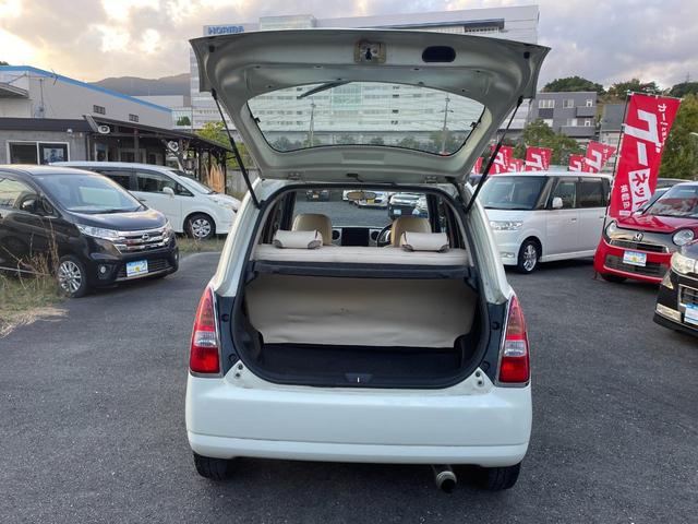 ミラジーノ Ｌ　禁煙車　社外品マフラー　コンビシート　キーレスエントリーキー　純正アルミホイール（１５５／６５Ｒ１４）電動式格納リモコンミラー（29枚目）