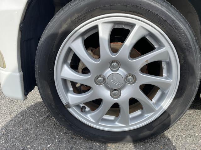 タント カスタムＶＳターボ　禁煙車　インタークーラーターボ　スマートキー　取扱説明書　ＭＯＭＯステェアリング　純正アルミホイール（１６５／５５Ｒ１５）ＨＩＤヘッドライト　電動リモコン格納ウィンカーミラー　センターヘッド格納ケース（10枚目）