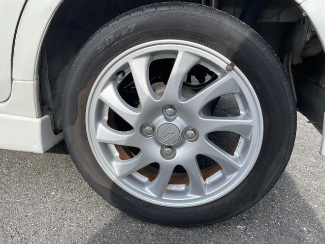 タント カスタムＶＳターボ　禁煙車　インタークーラーターボ　スマートキー　取扱説明書　ＭＯＭＯステェアリング　純正アルミホイール（１６５／５５Ｒ１５）ＨＩＤヘッドライト　電動リモコン格納ウィンカーミラー　センターヘッド格納ケース（14枚目）