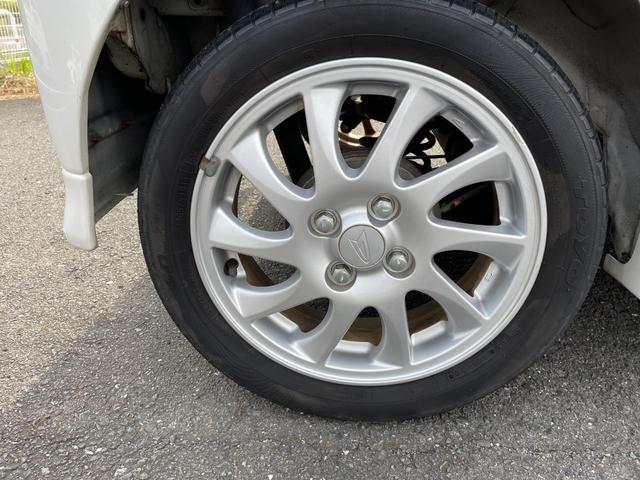 タント カスタムＶＳターボ　禁煙車　インタークーラーターボ　スマートキー　取扱説明書　ＭＯＭＯステェアリング　純正アルミホイール（１６５／５５Ｒ１５）ＨＩＤヘッドライト　電動リモコン格納ウィンカーミラー　センターヘッド格納ケース（15枚目）