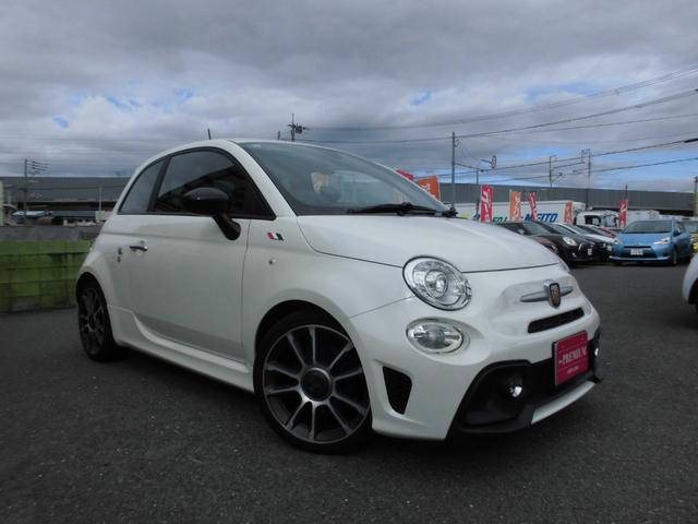 アバルト５９５ ツーリズモ　１オーナー　禁煙車　後期モデル　アイスホワイト　１６５ＰＳ　パドルシフト　ＴＦＴ液晶　純正１７ＡＷ　茶革　２ＤＩＮナビ　フルセグ　ＥＴＣ　アルミペダル（3枚目）