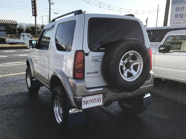 ジムニー ランドベンチャー　リフトアップ車　社外アルミホイール　オーバーフェンダー　　ＥＴＣ　マニュアルエアコン　パワーウィンドウ　電動格納ミラー　前席両側エアバック　ＣＤチューナー　パールホワイト（5枚目）