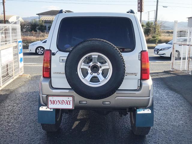 ジムニー ランドベンチャー　リフトアップ車　社外アルミホイール　オーバーフェンダー　　ＥＴＣ　マニュアルエアコン　パワーウィンドウ　電動格納ミラー　前席両側エアバック　ＣＤチューナー　パールホワイト（6枚目）