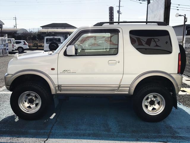 ジムニー ランドベンチャー　リフトアップ車　社外アルミホイール　オーバーフェンダー　　ＥＴＣ　マニュアルエアコン　パワーウィンドウ　電動格納ミラー　前席両側エアバック　ＣＤチューナー　パールホワイト（9枚目）