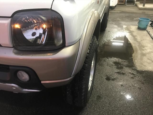 ジムニー ランドベンチャー　リフトアップ車　社外アルミホイール　オーバーフェンダー　　ＥＴＣ　マニュアルエアコン　パワーウィンドウ　電動格納ミラー　前席両側エアバック　ＣＤチューナー　パールホワイト（31枚目）