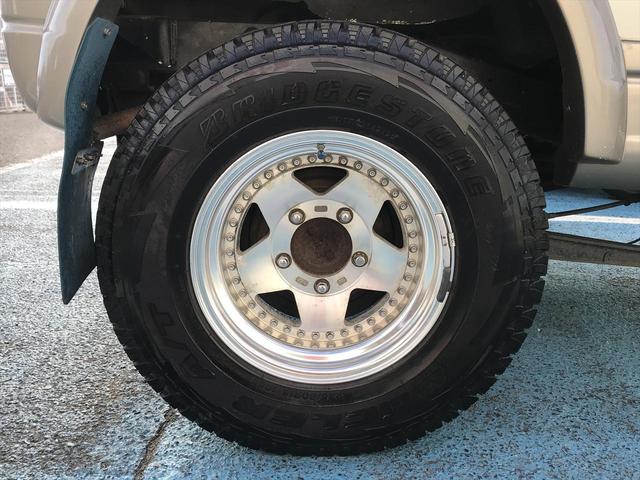 ジムニー ランドベンチャー　リフトアップ車　社外アルミホイール　オーバーフェンダー　　ＥＴＣ　マニュアルエアコン　パワーウィンドウ　電動格納ミラー　前席両側エアバック　ＣＤチューナー　パールホワイト（35枚目）