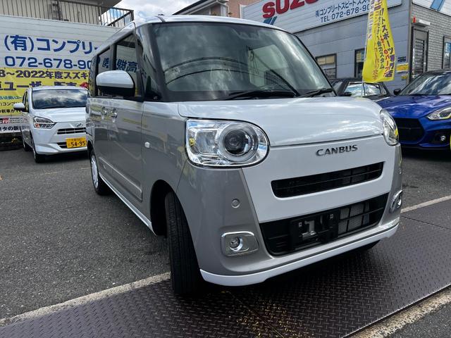 ムーヴキャンバス ストライプスＧ　衝突軽減　両側電動スライドドア　シートヒーター　ＬＥＤヘッド・フォグ　オートエアコン　オートライト　スマートキー　アイドリングストップ　横滑り防止　シートリフター　バニティミラー（49枚目）