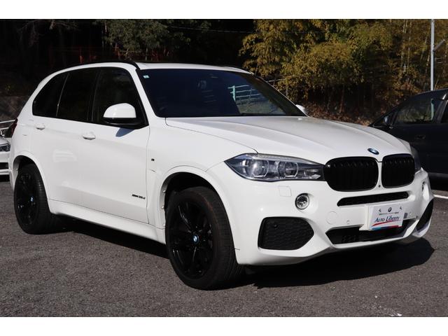 Ｘ５ リミテッドホワイト　２年間保証付　限定車　電動サンルーフ　黒革シート　シートヒーター　ハーマンカードン　ソフトクローズ　純正ＨＤＤナビ　地デジＴＶ　サラウンドビュー　純正２０インチＡＷ　パワーバックドア　ＡＣＣ　ＥＴＣ（4枚目）