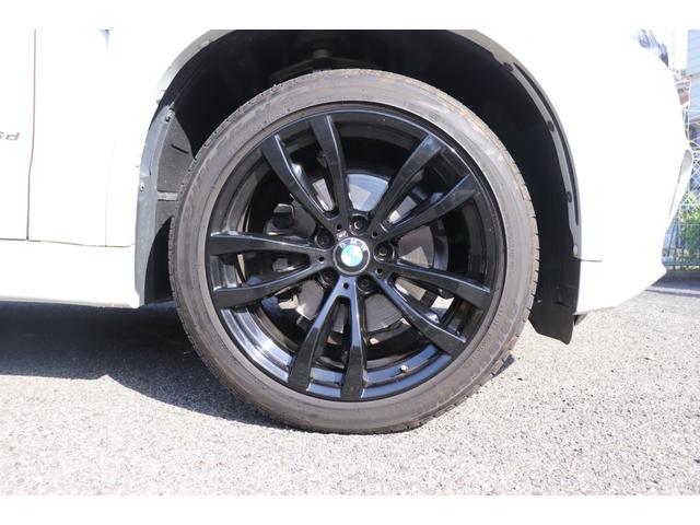 Ｘ５ リミテッドホワイト　２年間保証付　限定車　電動サンルーフ　黒革シート　シートヒーター　ハーマンカードン　ソフトクローズ　純正ＨＤＤナビ　地デジＴＶ　サラウンドビュー　純正２０インチＡＷ　パワーバックドア　ＡＣＣ　ＥＴＣ（12枚目）