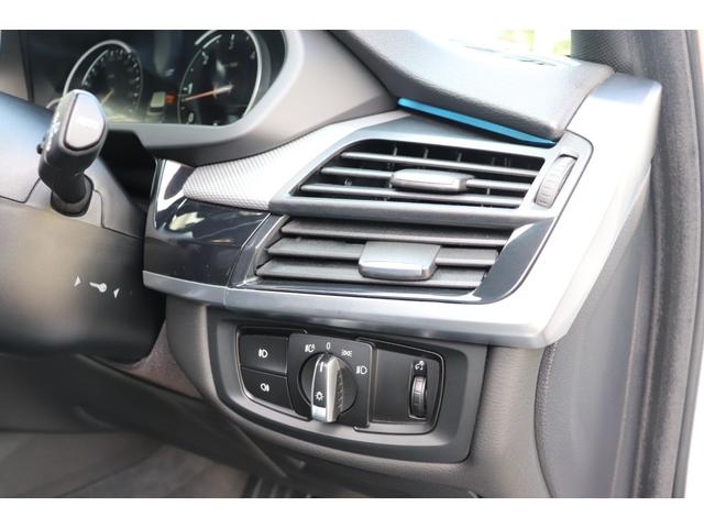 Ｘ５ リミテッドホワイト　２年間保証付　限定車　電動サンルーフ　黒革シート　シートヒーター　ハーマンカードン　ソフトクローズ　純正ＨＤＤナビ　地デジＴＶ　サラウンドビュー　純正２０インチＡＷ　パワーバックドア　ＡＣＣ　ＥＴＣ（24枚目）