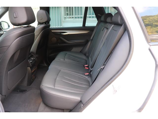 Ｘ５ リミテッドホワイト　２年間保証付　限定車　電動サンルーフ　黒革シート　シートヒーター　ハーマンカードン　ソフトクローズ　純正ＨＤＤナビ　地デジＴＶ　サラウンドビュー　純正２０インチＡＷ　パワーバックドア　ＡＣＣ　ＥＴＣ（52枚目）