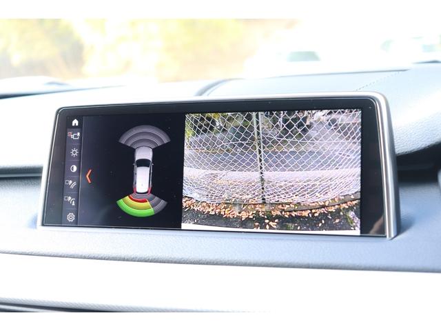 Ｘ５ リミテッドホワイト　２年間保証付　限定車　電動サンルーフ　黒革シート　シートヒーター　ハーマンカードン　ソフトクローズ　純正ＨＤＤナビ　地デジＴＶ　サラウンドビュー　純正２０インチＡＷ　パワーバックドア　ＡＣＣ　ＥＴＣ（70枚目）
