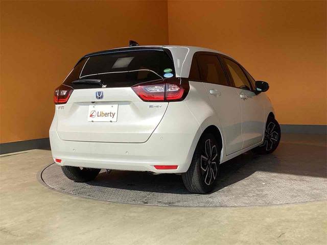 フィット e:HEVホーム ETC バックカメラ クリアランスソナー オートクルーズコントロール レーンアシスト 衝突被害軽減システム アルミホイール オートライト LEDヘッドランプ スマートキー(7枚目)