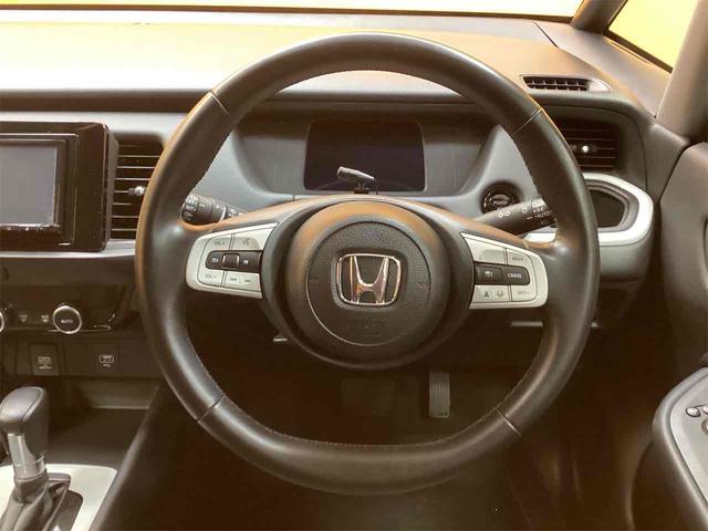 フィット ｅ：ＨＥＶホーム　社外ナビ　ＥＴＣ　バックカメラ　ＴＶ　クリアランスソナー　オートクルーズコントロール　衝突被害軽減システム　オートライト　ＬＥＤヘッドランプ　スマートキー　電動格納ミラー　ＣＶＴ　盗難防止システム（27枚目）