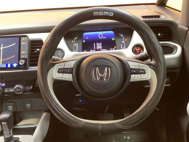 フィット ｅ：ＨＥＶホーム　ＥＴＣ　バックカメラ　ナビ　クリアランスソナー　オートクルーズコントロール　レーンアシスト　衝突被害軽減システム　アルミホイール　オートライト　ＬＥＤヘッドランプ　スマートキー（21枚目）