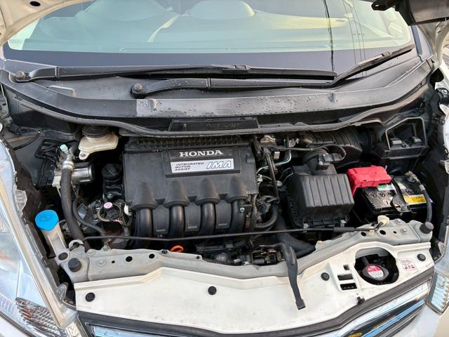 フィットハイブリッド シーズ　ファインスタイル　車検２年　禁煙車　シートヒーター　クルーズコントロール　ディーラーナビ　地デジＴＶ　Ｒカメラ　ＥＴＣ（14枚目）