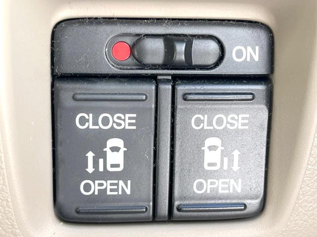 N-BOX G SSパッケージ 純正ナビ 後席モニター バックカメラ 両側電動スライドドア 衝突被害軽減システム 禁煙車 シートヒーター スマートキー HIDヘッドライト ETC オートライト オートエアコン 純正14インチAW(6枚目)