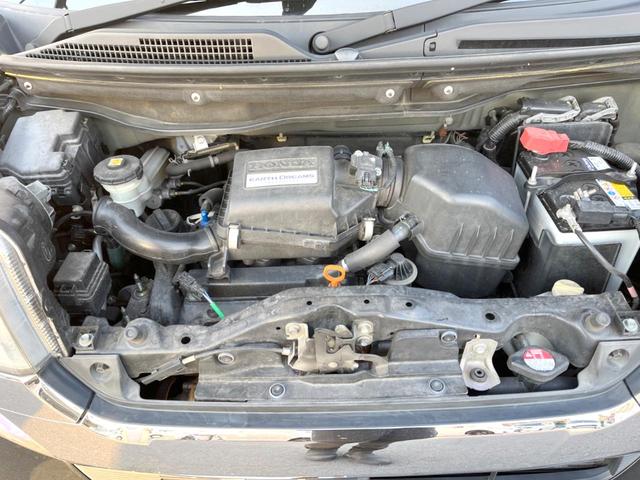 N-BOXカスタム G SSパッケージ 純正ナビ バックカメラ 両側電動スライドドア 禁煙車 シートヒーター スマートキー HIDヘッドライト ETC 純正14インチAW オートライト オートエアコン Bluetooth CD/DVD再生(18枚目)