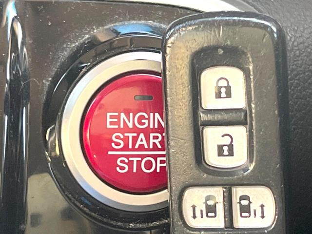 N-BOXカスタム G SSパッケージ 純正ナビ バックカメラ 両側電動スライドドア 禁煙車 シートヒーター スマートキー HIDヘッドライト ETC 純正14インチAW オートライト オートエアコン Bluetooth CD/DVD再生(32枚目)