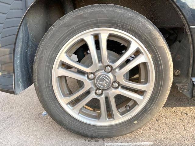 N-BOXカスタム G SSパッケージ 純正ナビ バックカメラ 両側電動スライドドア 禁煙車 シートヒーター スマートキー HIDヘッドライト ETC 純正14インチAW オートライト オートエアコン Bluetooth CD/DVD再生(49枚目)