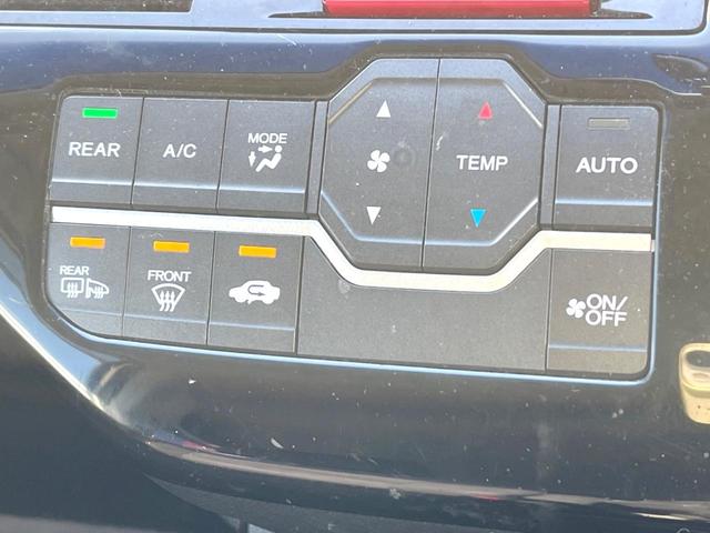 ステップワゴンスパーダ Ｚ　純正ナビ　バックカメラ　両側電動スライドドア　禁煙車　ＨＩＤヘッドライト　ＥＴＣ　純正１６インチＡＷ　オートライト　オートエアコン　ＣＤ／ＤＶＤ再生　地デジ　ＨＩＤフォグ（32枚目）