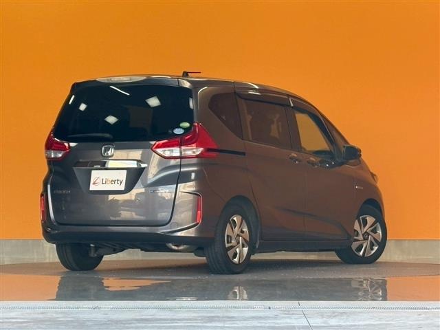 フリードハイブリッド ハイブリッド・Gホンダセンシング ETC バックカメラ TV オートクルーズコントロール レーンアシスト 衝突被害軽減システム 両側電動スライドドア オートライト LEDヘッドランプ スマートキー アイドリングストップ 電動格納ミラー(17枚目)