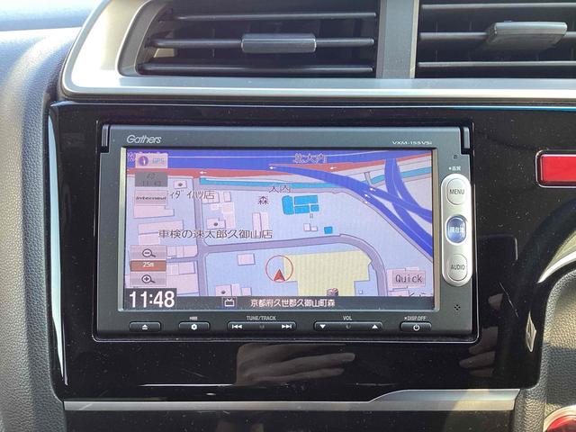 フィット １３Ｇ・Ｆパッケージ　ＥＴＣ　バックカメラ　ナビ　ＴＶ　スマートキー　アイドリングストップ　電動格納ミラー　ＣＶＴ　盗難防止システム　衝突安全ボディ　ＡＢＳ　ＥＳＣ　ＣＤ　ＤＶＤ再生　ＵＳＢ　ミュージックプレイヤー接続可（6枚目）