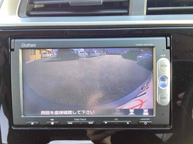 フィット １３Ｇ・Ｆパッケージ　ＥＴＣ　バックカメラ　ナビ　ＴＶ　スマートキー　アイドリングストップ　電動格納ミラー　ＣＶＴ　盗難防止システム　衝突安全ボディ　ＡＢＳ　ＥＳＣ　ＣＤ　ＤＶＤ再生　ＵＳＢ　ミュージックプレイヤー接続可（7枚目）