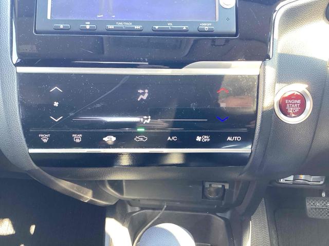 フィット １３Ｇ・Ｆパッケージ　ＥＴＣ　バックカメラ　ナビ　ＴＶ　スマートキー　アイドリングストップ　電動格納ミラー　ＣＶＴ　盗難防止システム　衝突安全ボディ　ＡＢＳ　ＥＳＣ　ＣＤ　ＤＶＤ再生　ＵＳＢ　ミュージックプレイヤー接続可（10枚目）