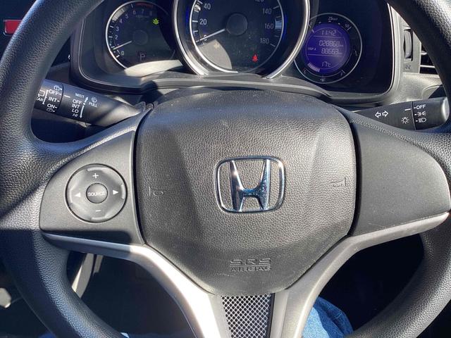 フィット １３Ｇ・Ｆパッケージ　ＥＴＣ　バックカメラ　ナビ　ＴＶ　スマートキー　アイドリングストップ　電動格納ミラー　ＣＶＴ　盗難防止システム　衝突安全ボディ　ＡＢＳ　ＥＳＣ　ＣＤ　ＤＶＤ再生　ＵＳＢ　ミュージックプレイヤー接続可（27枚目）