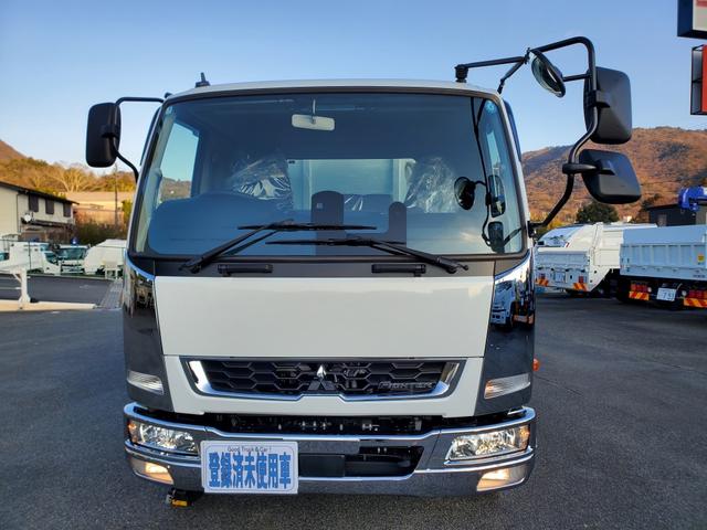 ファイター 　増トン　土砂ダンプ　７．８トン積載　新明和工業製　３．４ｍボディ　強化一方開　角底　容積４．０ｍ３　油圧式自重計　標準幅　ベッド付（44枚目）