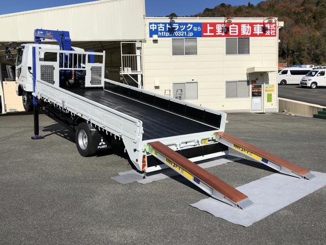 ファイター 　増トン　４段セルフクレーン　重機運搬車　６．７ｔ積載　タダノ　警報仕様　ウインチ　あゆみ板付　５．７ｍボディ　横根太増し強化　ワイド幅　ベッド付（2枚目）