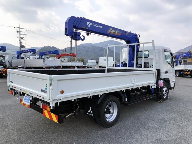 キャンター 　４段クレーン付　３．８トン積載　タダノ　警報仕様　ワイド　ロング　３．７ｍ長ボディ　全低床　ワイド丸足アウトリガ　木製あおり３方開（5枚目）
