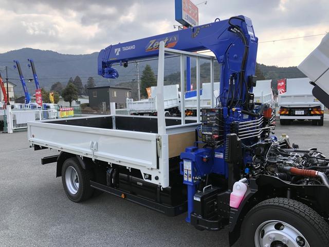 キャンター 　４段クレーン付　３．８トン積載　タダノ　警報仕様　ワイド　ロング　３．７ｍ長ボディ　全低床　ワイド丸足アウトリガ　木製あおり３方開（33枚目）
