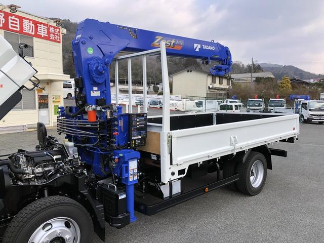 キャンター 　４段クレーン付　３．８トン積載　タダノ　警報仕様　ワイド　ロング　３．７ｍ長ボディ　全低床　ワイド丸足アウトリガ　木製あおり３方開（34枚目）