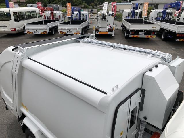 キャンター 　プレス式パッカー車　４．３ｍ３　新明和工業製　２．３ｔ積載　連続積込　汚水タンク付　標準幅　リヤシャッター式扉　１５０馬力　準中型７．５ｔ免許（46枚目）