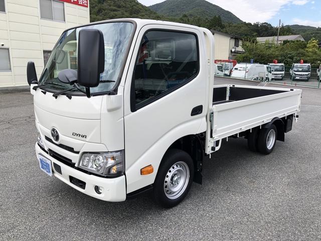 ダイナトラック 　平ボディ　１２５０ｋｇ積載　４ナンバー　ガソリン車　３．１ｍボディ　Ｗタイヤ　標準幅　１０尺　低床ジャストロー　木製あおり３方開（3枚目）