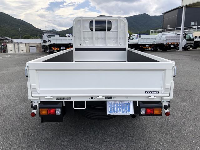 ダイナトラック 　平ボディ　１２５０ｋｇ積載　４ナンバー　ガソリン車　３．１ｍボディ　Ｗタイヤ　標準幅　１０尺　低床ジャストロー　木製あおり３方開（6枚目）
