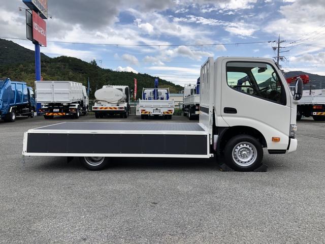 ダイナトラック 　平ボディ　１２５０ｋｇ積載　４ナンバー　ガソリン車　３．１ｍボディ　Ｗタイヤ　標準幅　１０尺　低床ジャストロー　木製あおり３方開（24枚目）