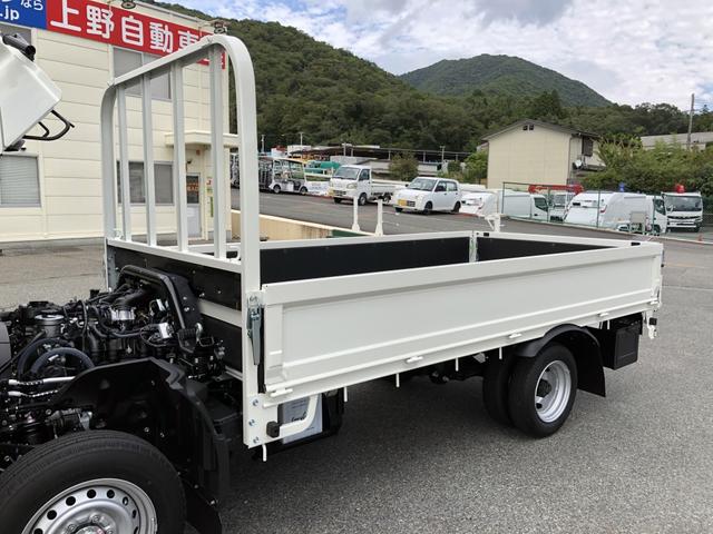 ダイナトラック 　平ボディ　１２５０ｋｇ積載　４ナンバー　ガソリン車　３．１ｍボディ　Ｗタイヤ　標準幅　１０尺　低床ジャストロー　木製あおり３方開（28枚目）