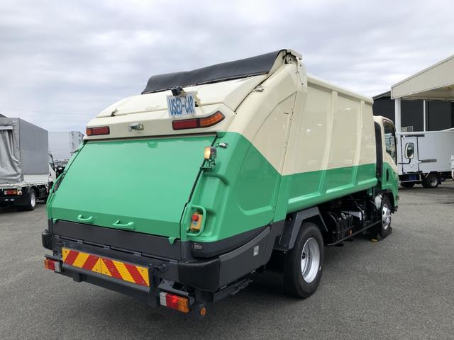 エルフトラック プレス式パッカー車 8.4m3 新明和工業製 2550kg積載 セミATスムーサーEx 連続積込 汚水タンク付 ワイド幅 ロング(4枚目)