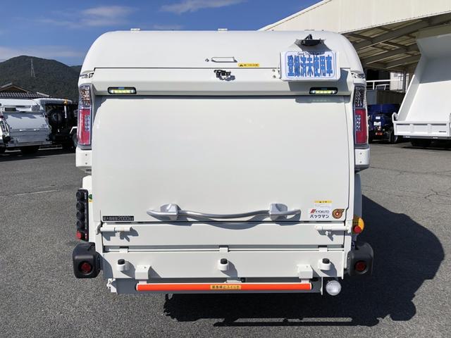 デュトロ 回転ダンプ式パッカー車 4.7m3 極東開発工業製 2トン積載 連続積込 汚水タンク付 標準幅 10尺規格 6速MT アドブルー不要 150馬力(6枚目)