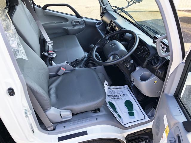 デュトロ 回転ダンプ式パッカー車 4.7m3 極東開発工業製 2トン積載 連続積込 汚水タンク付 標準幅 10尺規格 6速MT アドブルー不要 150馬力(9枚目)