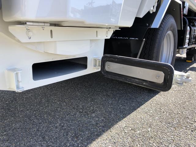 デュトロ 回転ダンプ式パッカー車 4.7m3 極東開発工業製 2トン積載 連続積込 汚水タンク付 標準幅 10尺規格 6速MT アドブルー不要 150馬力(27枚目)