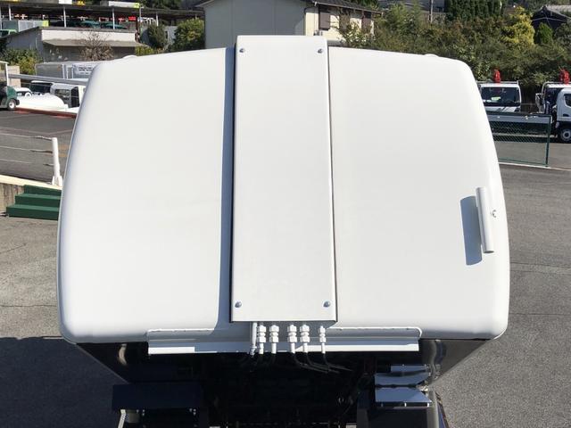 デュトロ 回転ダンプ式パッカー車 4.7m3 極東開発工業製 2トン積載 連続積込 汚水タンク付 標準幅 10尺規格 6速MT アドブルー不要 150馬力(28枚目)