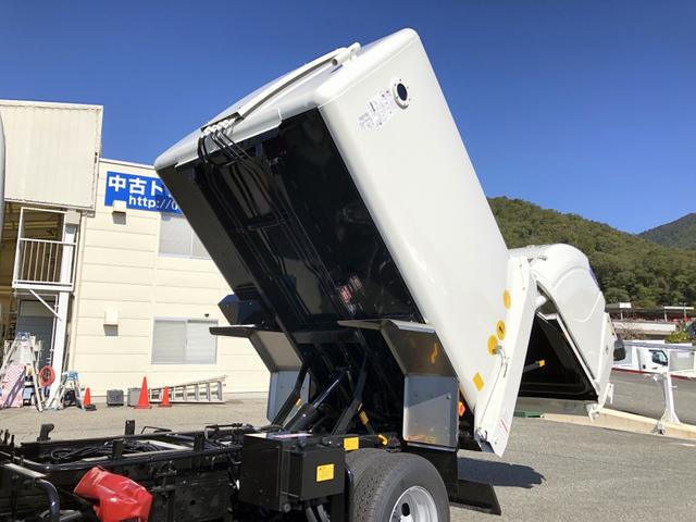 デュトロ 回転ダンプ式パッカー車 4.7m3 極東開発工業製 2トン積載 連続積込 汚水タンク付 標準幅 10尺規格 6速MT アドブルー不要 150馬力(33枚目)