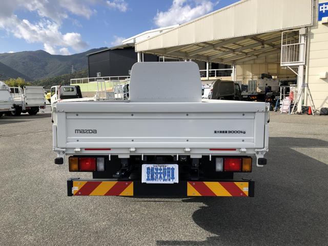 タイタントラック 平ボディ 3t積載 エルフOEM 標準幅 ロング 高床 木製あおり3方開 ボディ長4.3 床板張り あおり開閉補助装置 6速MT(6枚目)